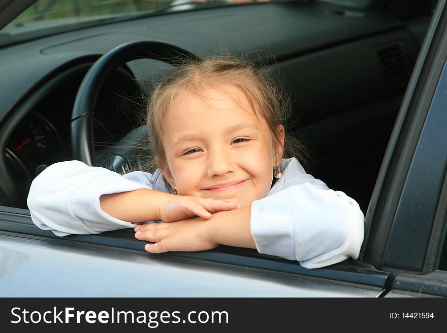 Young Girl In The Car