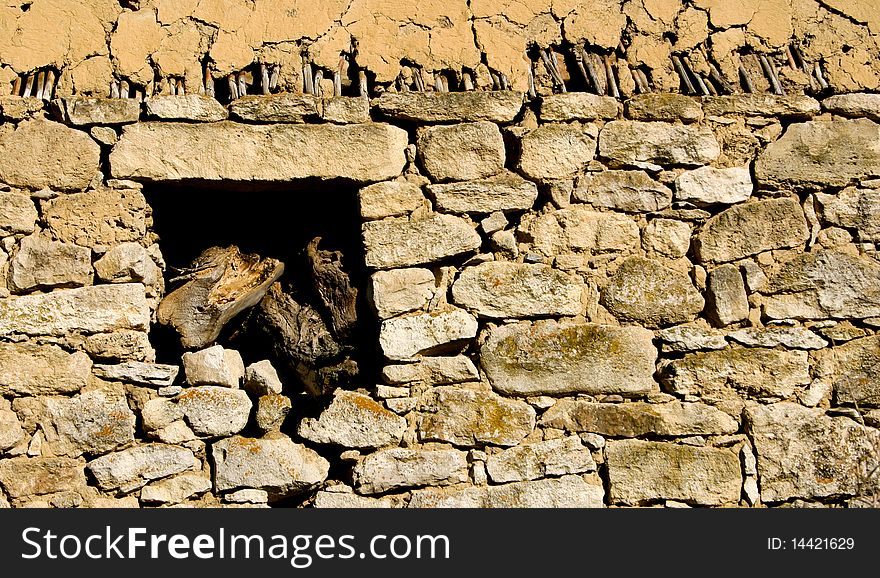 An image of old yellow stone wall. An image of old yellow stone wall
