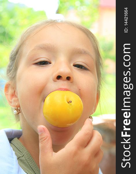 Young girl biting the apple. Young girl biting the apple