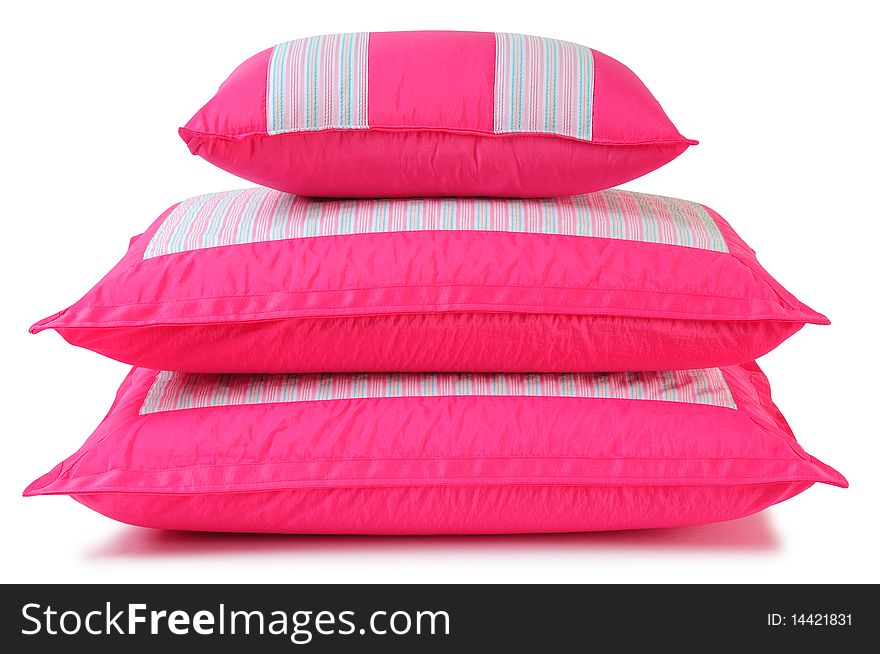 Soft pink pillow isolated over white background. Soft pink pillow isolated over white background.