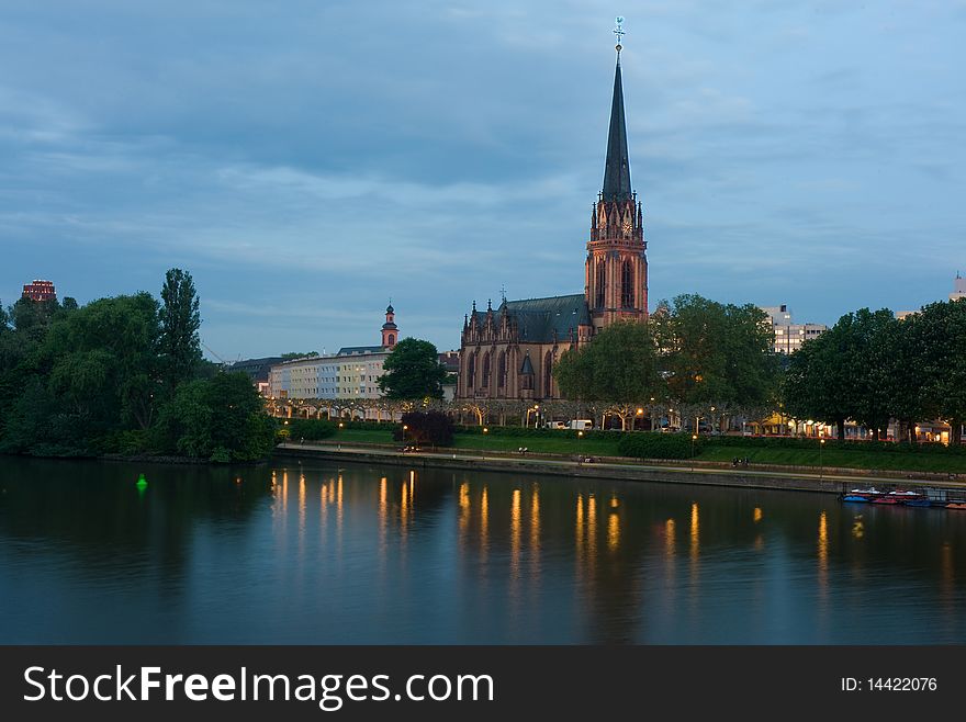 Churcjh on the bank of the Main in the evening. Churcjh on the bank of the Main in the evening