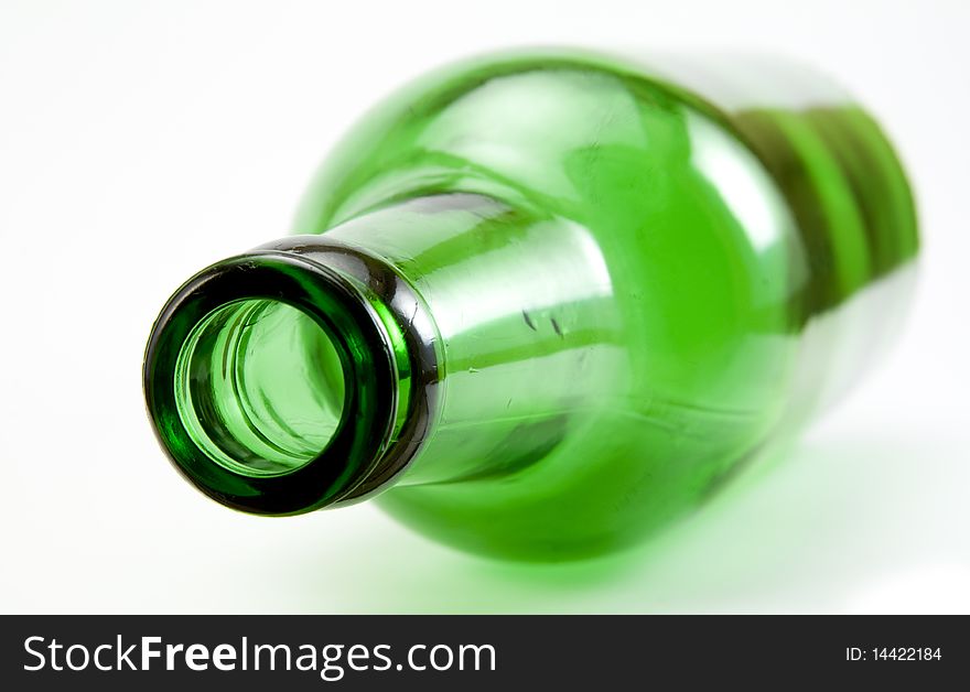 Green beer bottle isolated on white