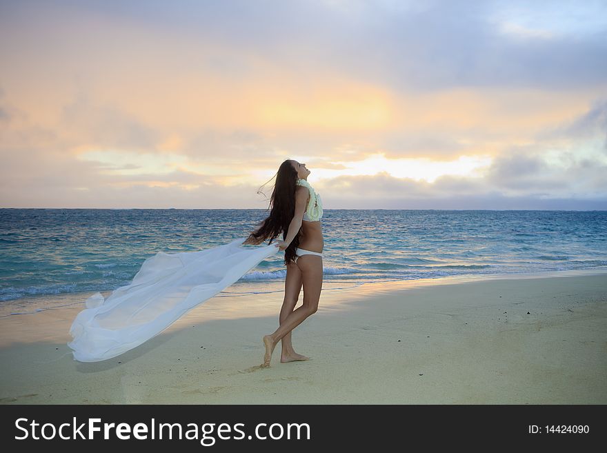 Woman On Lanikai Beach At Sunrise