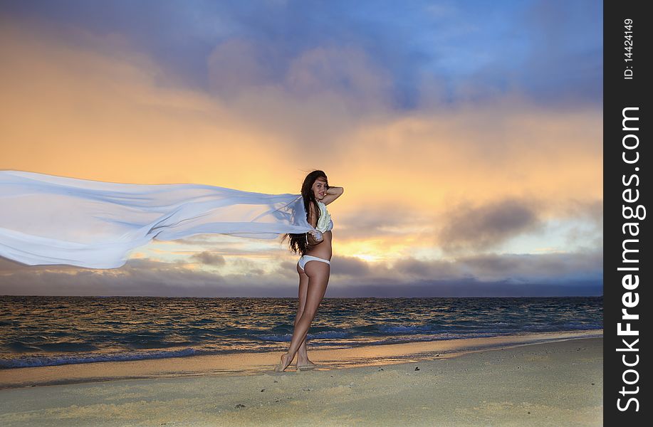 Woman On Lanikai Beach At Sunrise