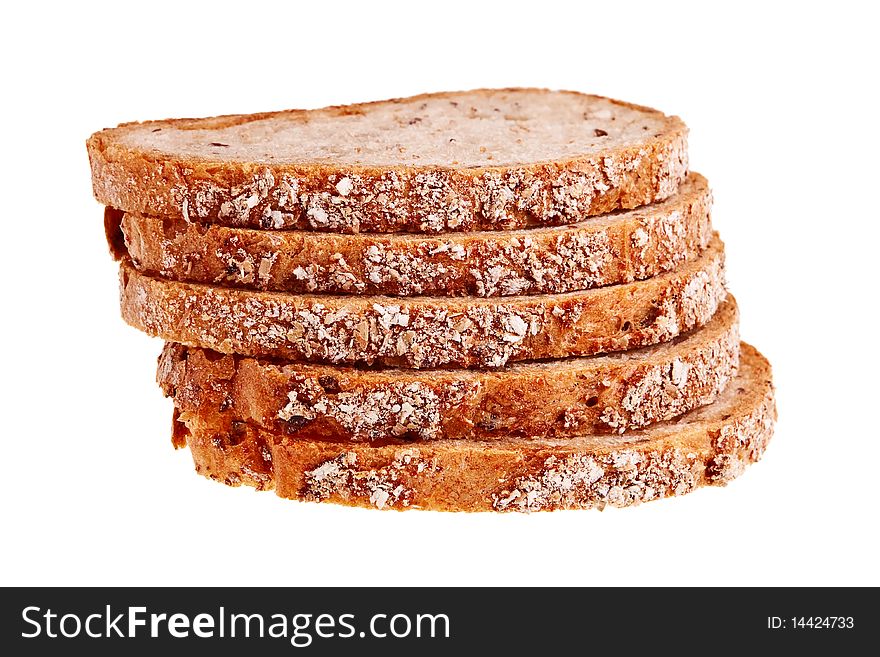 Five slices of wheat bread stacked isolated over white background. Five slices of wheat bread stacked isolated over white background.