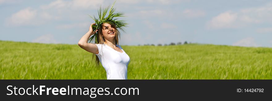 Young happy girl on natural background