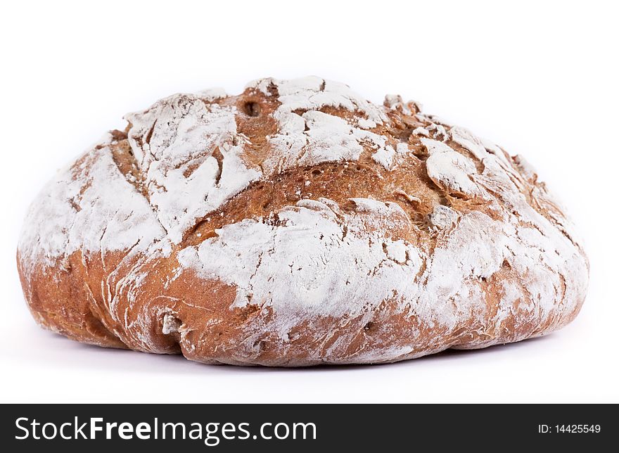 Homemade nut bread in front of white background