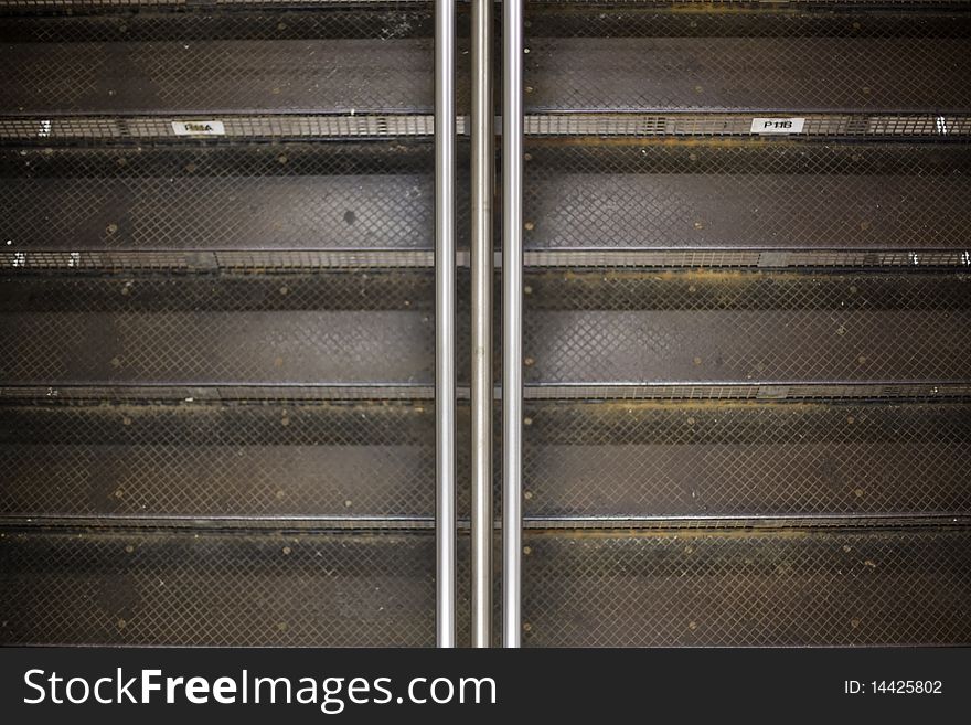 Metal railings and steps leading to the subway platform. Metal railings and steps leading to the subway platform