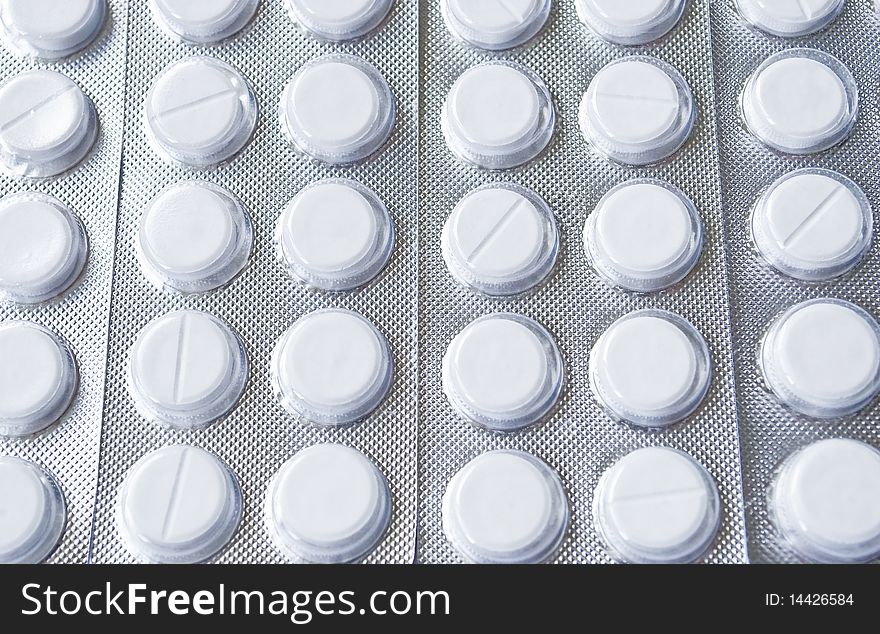 White Tablets Packed In Tin Blisters