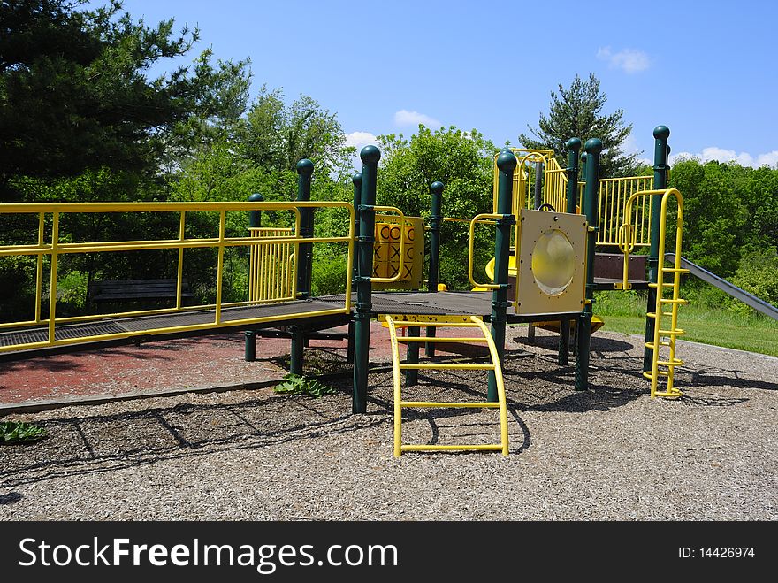 Yellow and green playground at the park