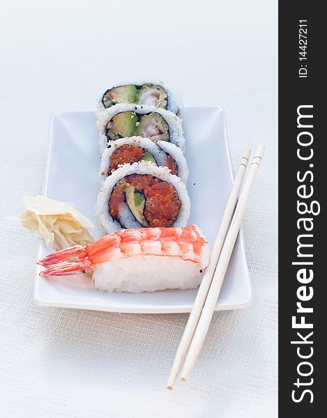 Sushi prepared with shrimps, salmon, tuna and vegetables. Sushi prepared with shrimps, salmon, tuna and vegetables