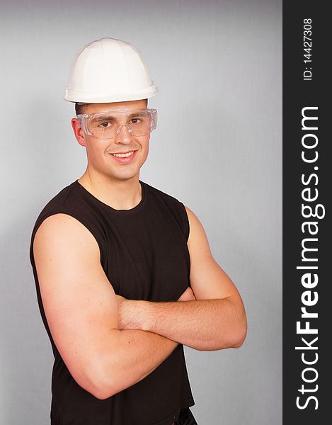 Portrait young man in a protective helmet