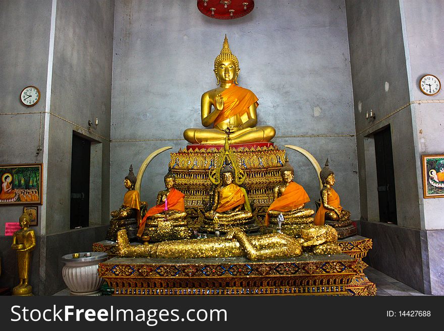 Sleeping Buddha laid face up decorate with golden sheets in Thailand