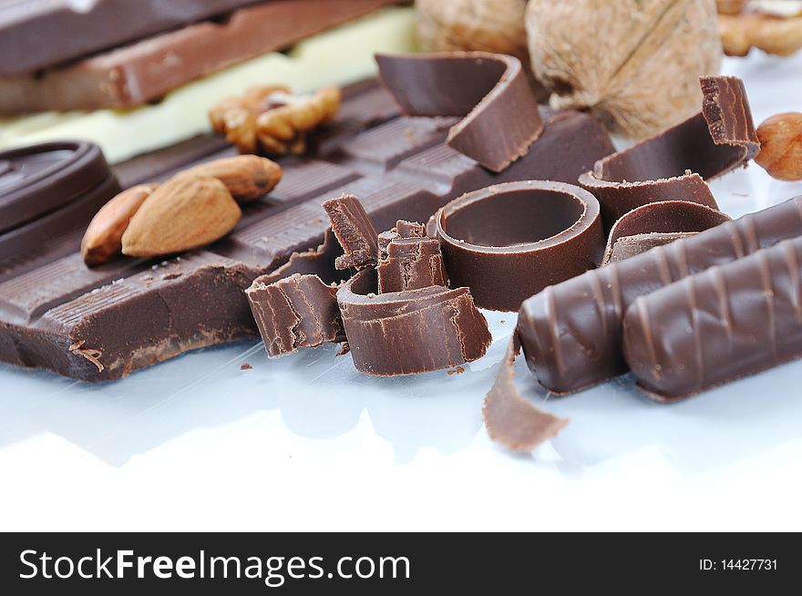 Chocolate, table, pieces, on white background