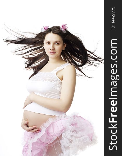 The image of a beautiful cute pregnant girl
