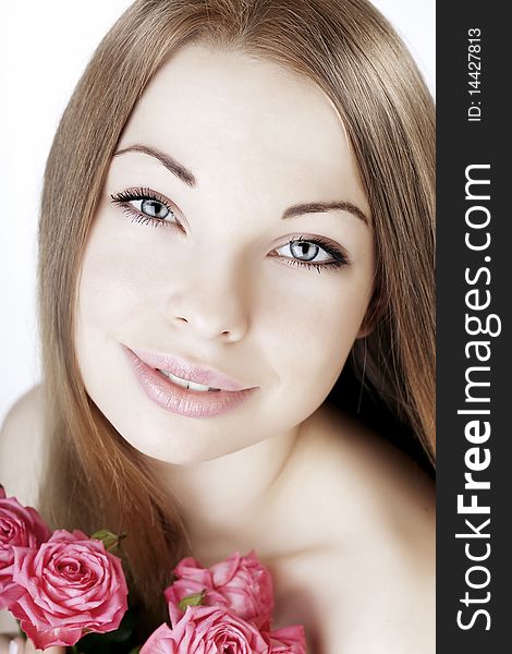 Beautiful Girl On A White Background With Roses