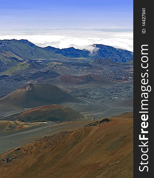 Clouds roll onto the summit of Haleakala volcano on Maui, Hawaii. Clouds roll onto the summit of Haleakala volcano on Maui, Hawaii