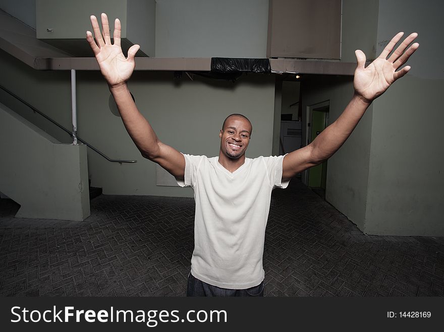 Man With Arms Outstretched