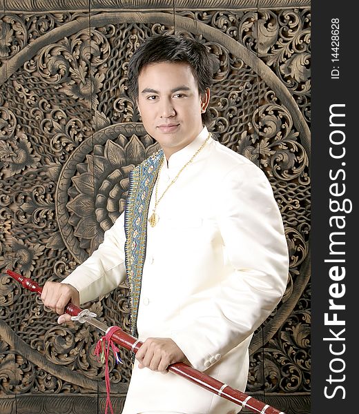 Asian thai man in silk dress