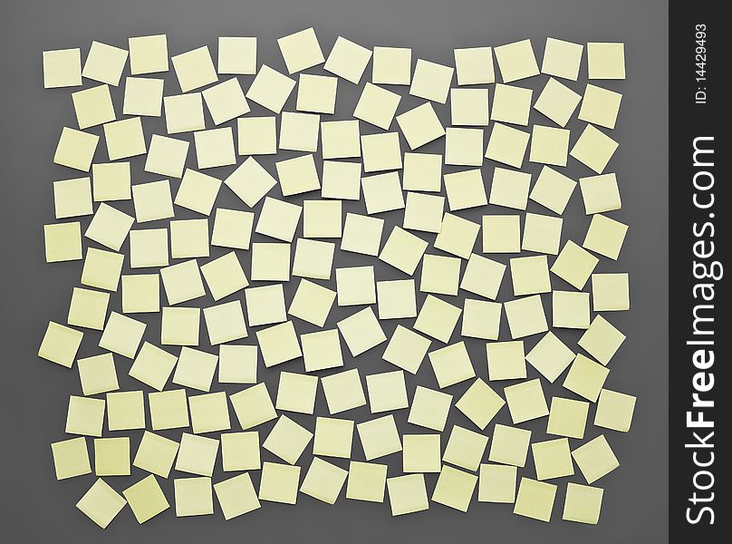 Yellow Adhesive Notes on grey background