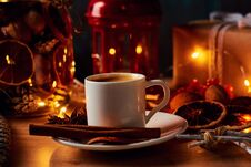 Cup Of Coffee In Festive Decorations With A Fairy Garland Lights Royalty Free Stock Image