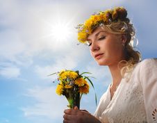 Woman With Dandelion Flowers Royalty Free Stock Images