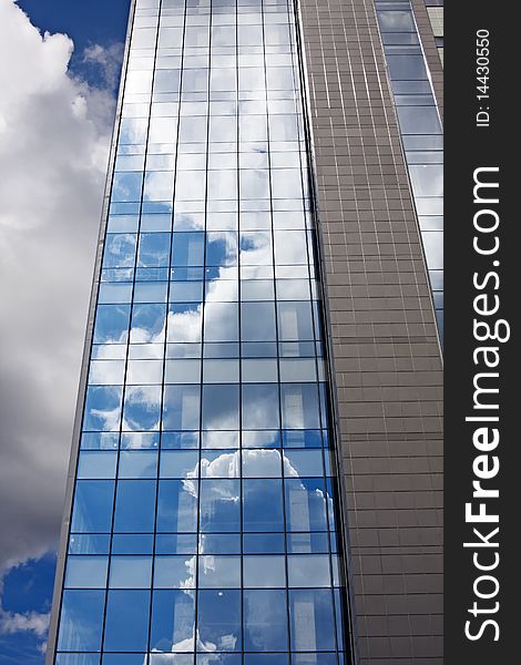 Facade of modern office building on a background of the blue sky