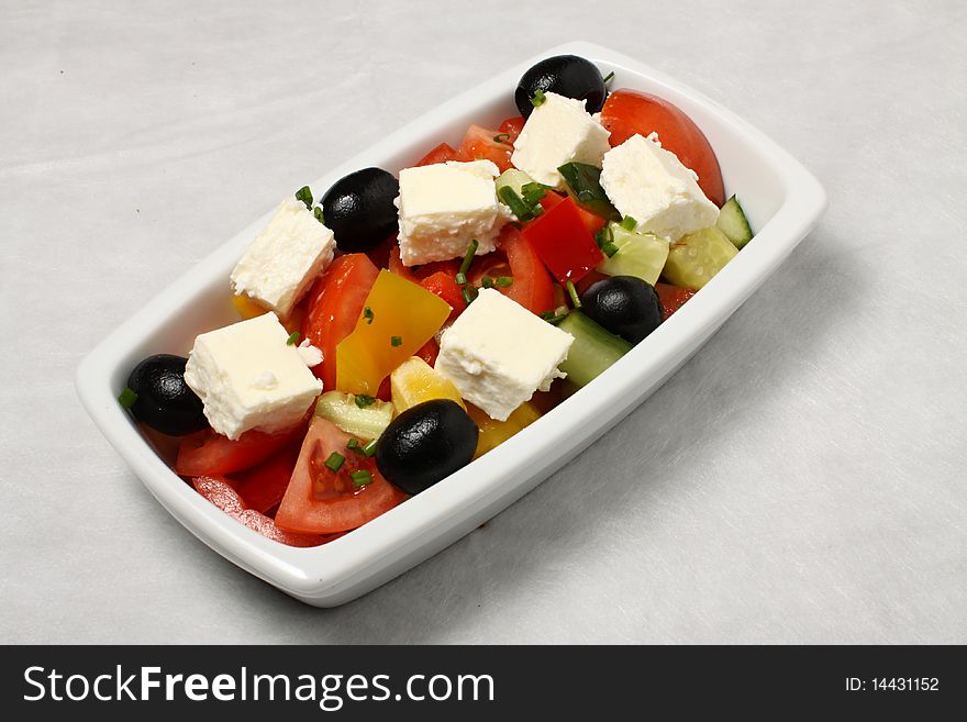 Single small dish with vegetables salad. Single small dish with vegetables salad