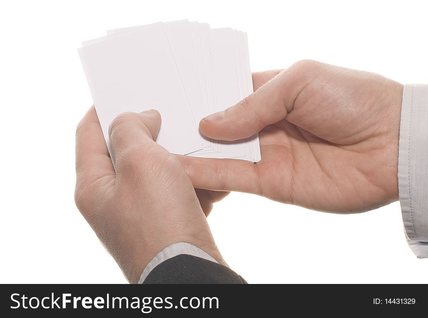 Hand holding an empty business card over white background