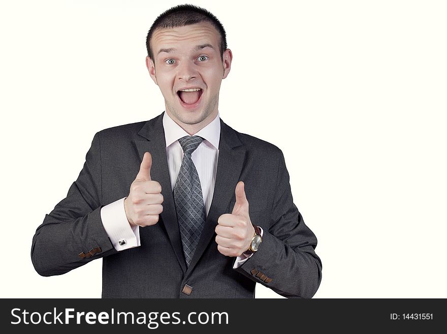 Young man posing with thumbs up. Young man posing with thumbs up