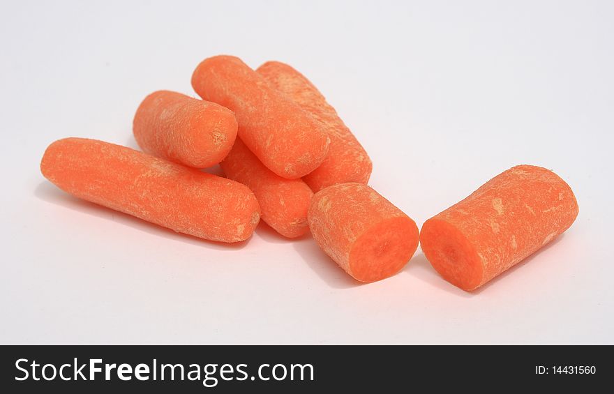 Baby carrots on white backgroun