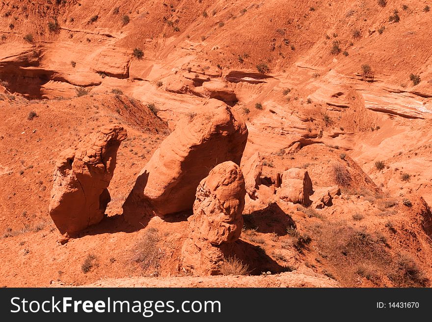 Stones in an orange canyon in Uzbekistan