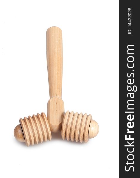 Wooden roller massager on white background