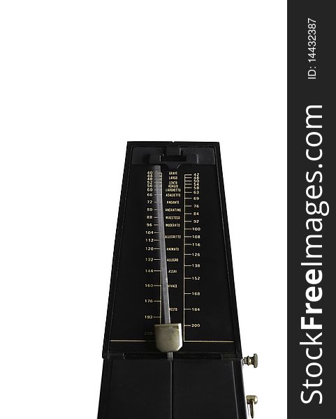 Black metronome on white background with meter blurred in movement. Black metronome on white background with meter blurred in movement