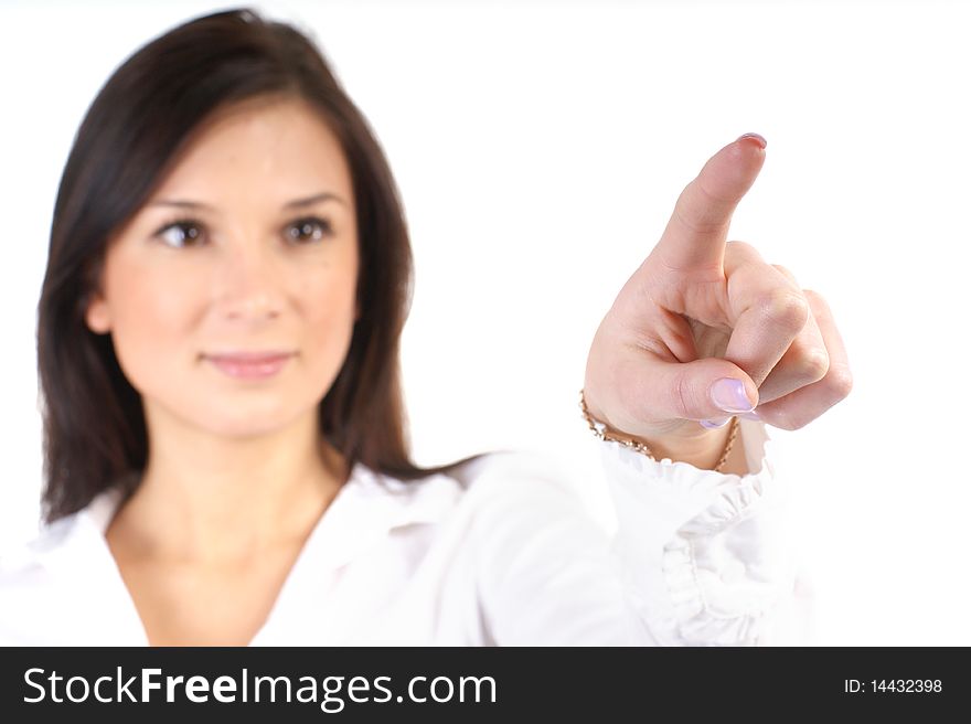 A young and attractive business woman is pointing at something. Image isolated on a white background. A young and attractive business woman is pointing at something. Image isolated on a white background.