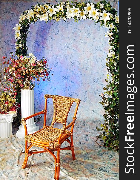 Wooden arm-chair and decorative pattern of flowers