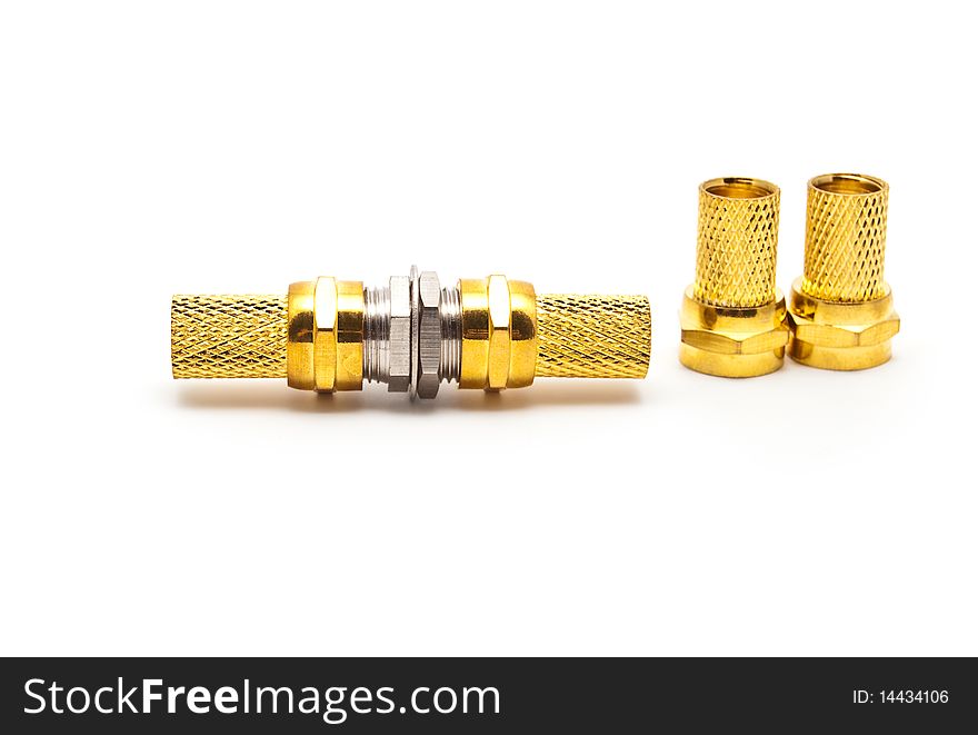 Gilded television connectors on a white background