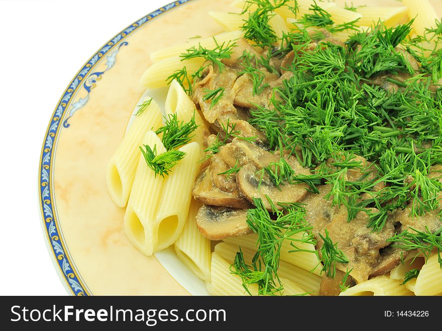 Penne pasta, mushrooms and dill decoration. Penne pasta, mushrooms and dill decoration