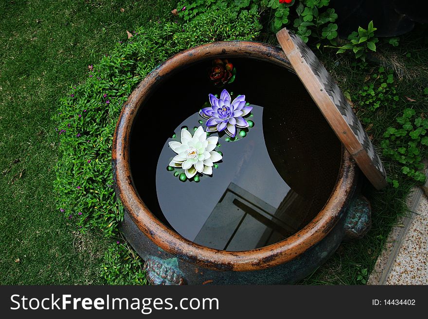 Garden water tanks within the two competing flowers bloom. Garden water tanks within the two competing flowers bloom