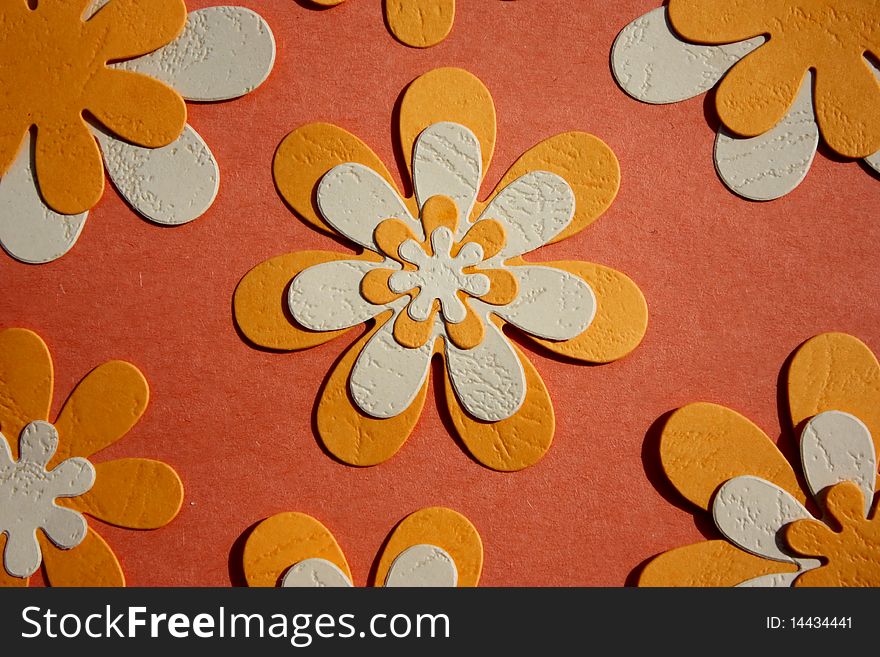 Colorful paper flower on brown background. Colorful paper flower on brown background