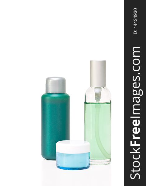 Cosmetic bottles isolated on a white background.