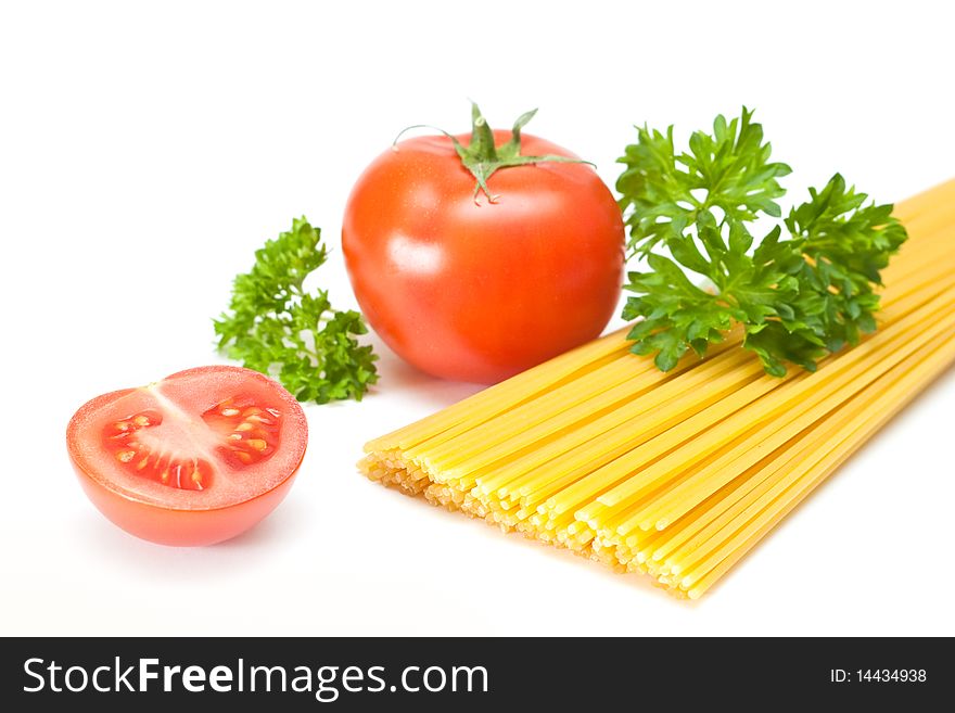 Tomatoes and pasta on a white background