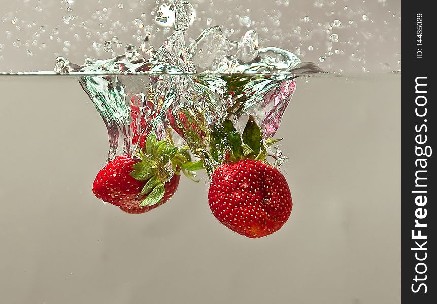 Fresh Strawberry splashing in Water. Fresh Strawberry splashing in Water