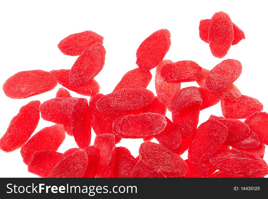 Red pineapple slices isolated on white