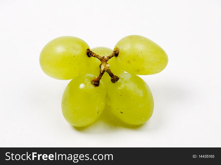 A bunch of grapes sitting on a table