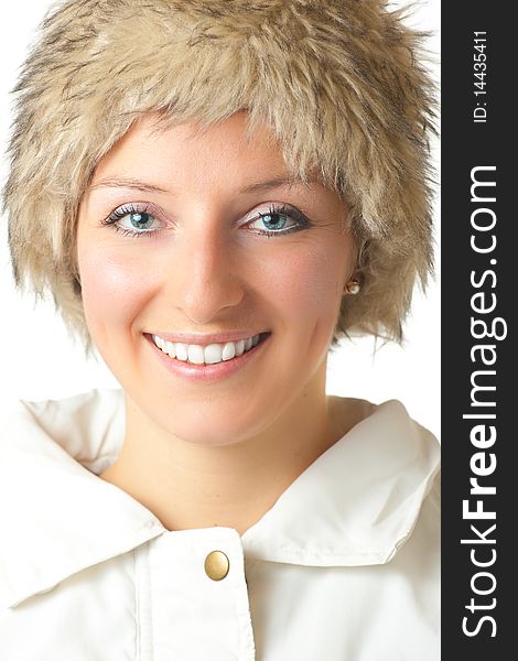 Woman in furry hat on white background