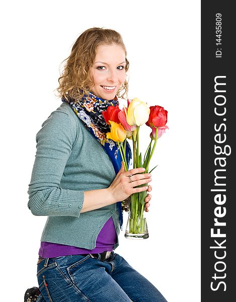 Caucasian young girl with tulips on isolated background