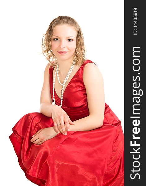 Young caucasian girl in dress on isolated background