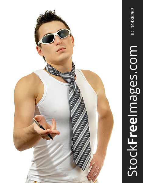 Portrait of attractive muscular man holding pen with tie in sunglasses