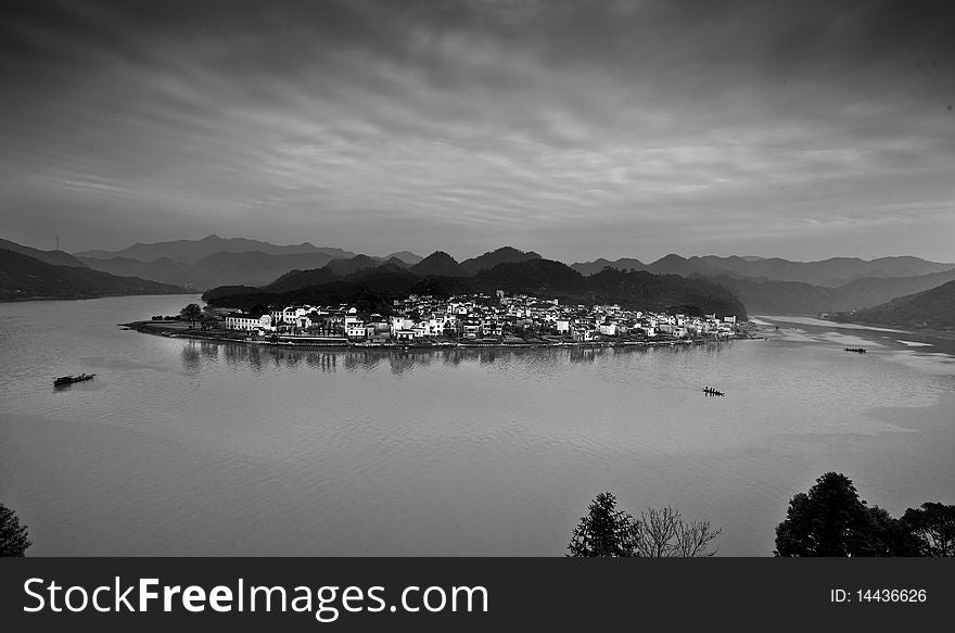 Peace lake scenery and a small village, China. Peace lake scenery and a small village, China